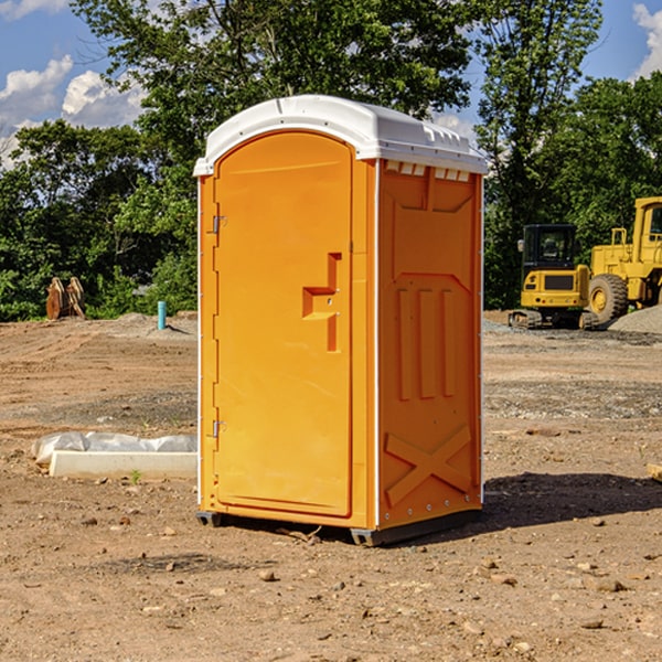 how often are the porta potties cleaned and serviced during a rental period in Slater